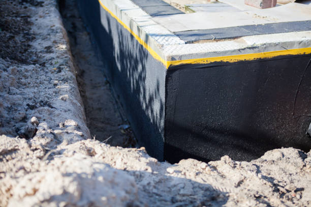 Professional Emergency Waterproofing technician working in Wyoming, NY